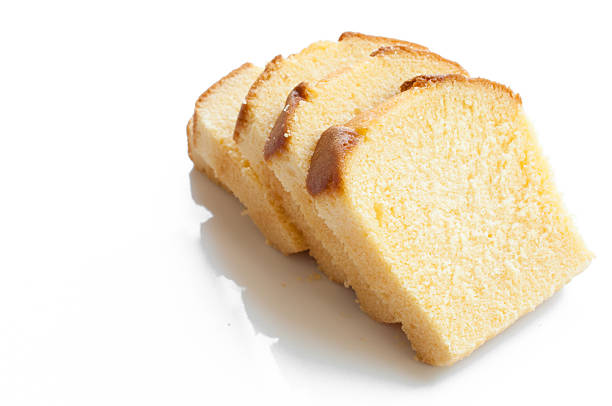 istock Butter cake sliced white background 469001128