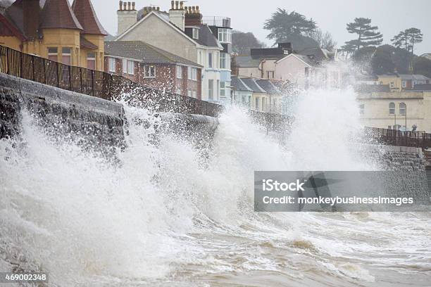 Large Waves Breaking Against Sea Wall At Dawlish In Devon Stock Photo - Download Image Now