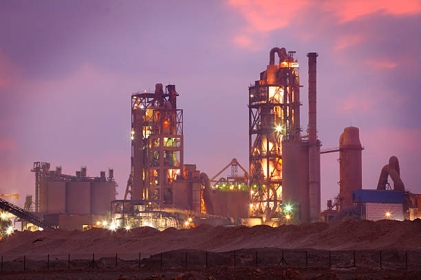 istock Cement factory by twilight 469003464