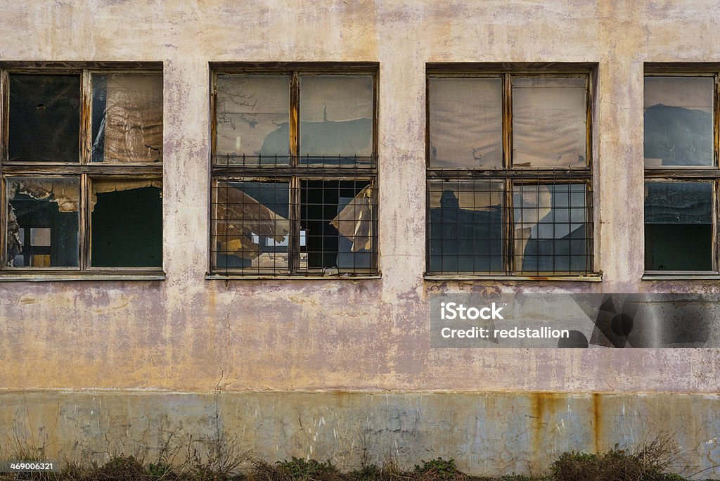 Old broken windows Old broken windows. Abandoned Stock Photo