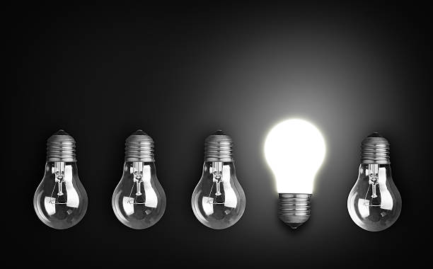 istock The fourth of five bulbs is illuminated and pointing up 469006951