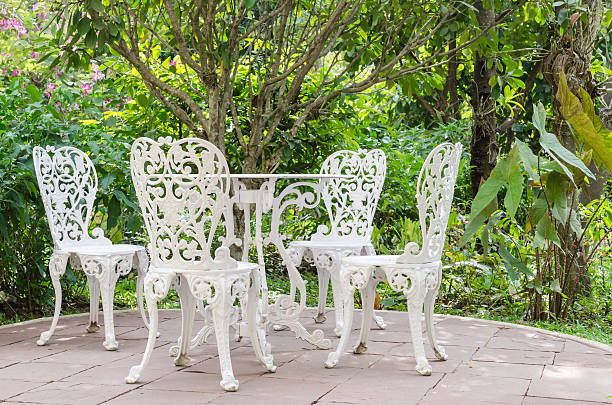istock White iron chair in garden 469010717