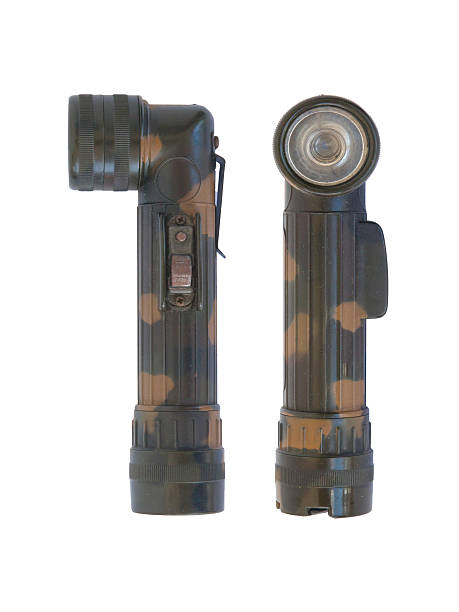 istock Used green military flash light on white background 469012237