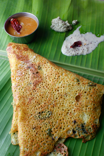 Rava dosa is a special dosa from India/South Asia. Rava dosa contains rava(semolina) as major ingredient and can be served with chutney.