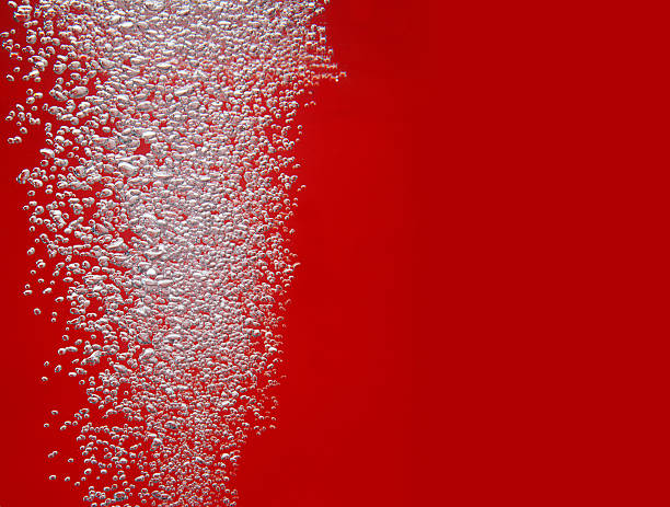 Mini bubbles in front of red background
