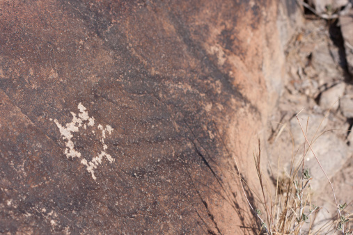 A tortoise petroglyph adorns a rock face in Sloan Canyon, Nevada