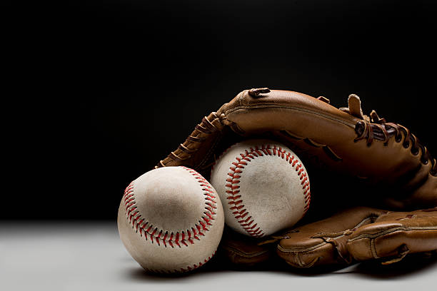 istock Baseballs and glove on clean background 469019247