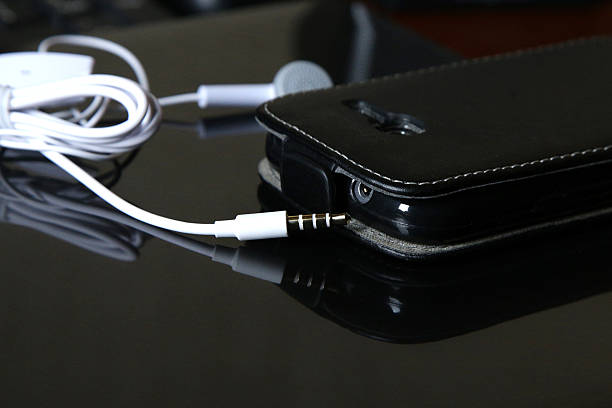 istock smart phone with earphones 469019586