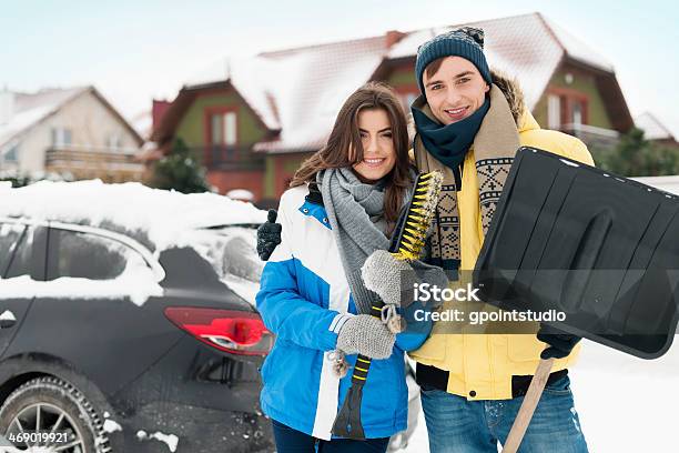 Happy Couple Are Ready To Cleaning Car From Snow Stock Photo - Download Image Now - Car, Winter, Couple - Relationship