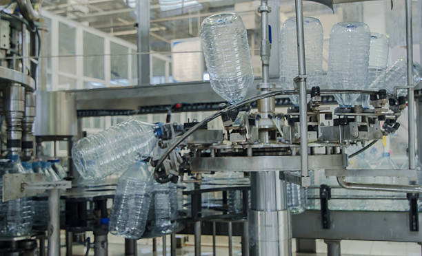 istock Water bottle machine in a factory 469024600