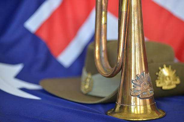 istock Bugle in front of slouch hat on an Australian flag 469025760