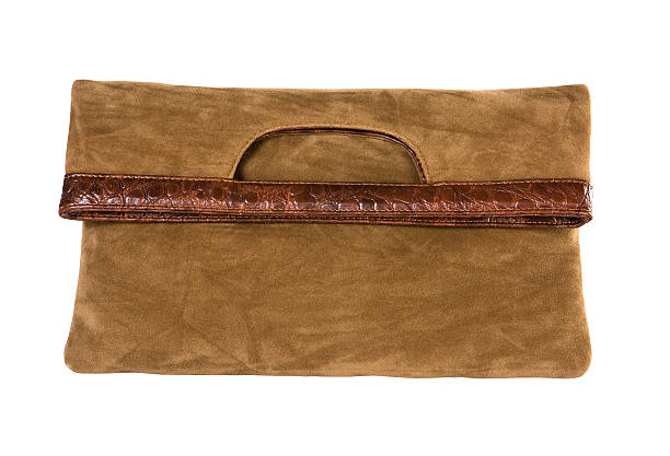 istock Brown clutch handbag over a white background 469027414