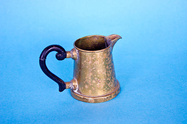 istock antique brass cup sauce boat 469029976
