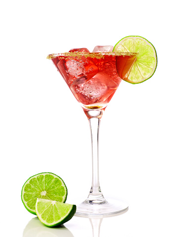 Red martini cocktail with lime