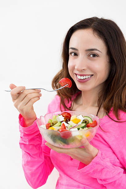 istock Woman with a salad bowl 469030278