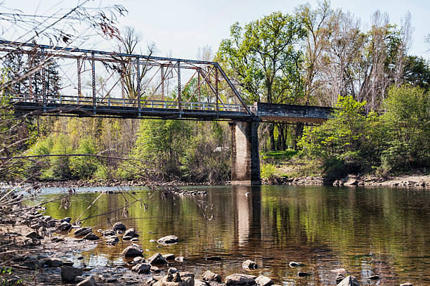 istock One Lane Bridge over American River with Low Water 469031536