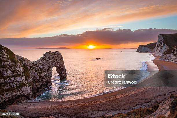 Durdle Door Dorset England Stock Photo - Download Image Now - Durdle Door, Sunset, 2015