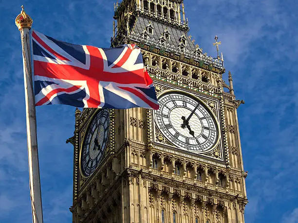 Photo of Big Ben and Union Jack flag in England