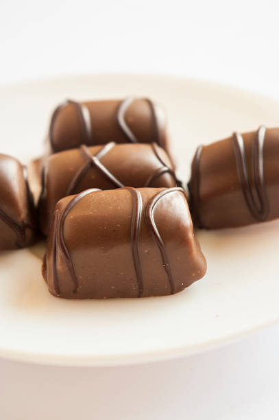 istock Tasty chocolate bonbon isolated on a white background 469035331