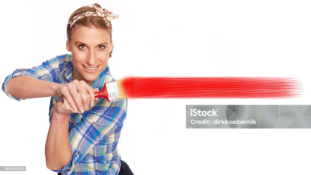 Young woman painting young woman in renovating the house 2015 Stock Photo