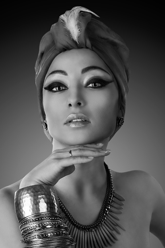 Beautiful woman in oriental style in turban