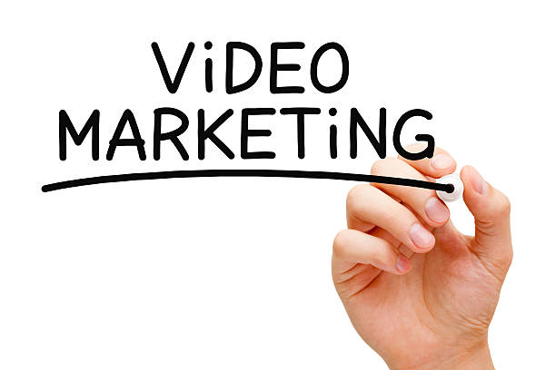 istock Hand writing Video Marketing using a black marker pen 469045606