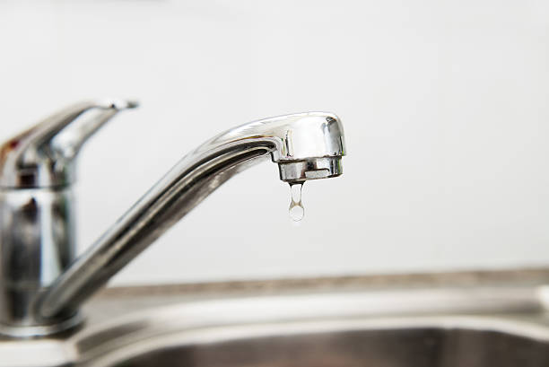 istock Mixer tap Faucet on the kitchen sink 469045868
