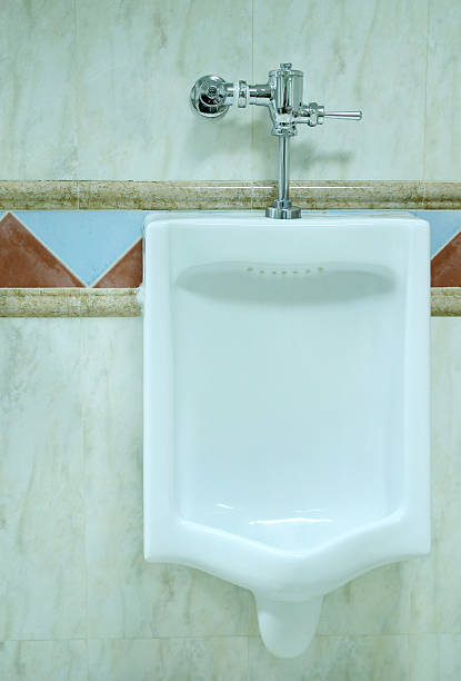 istock urinal in a men's restroom 469049311