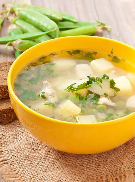 Chicken soup with green peas