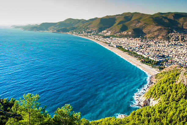 The blue coast of Alanya seen from a mountain city harbor of Alanya, Antalya, Turkey alanya stock pictures, royalty-free photos & images