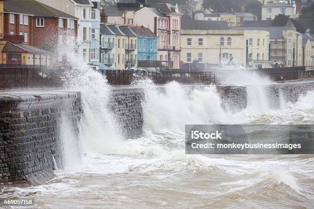 Large Waves Breaking Against The Sea Wall At Dawlish Devon Stock Photo - Download Image Now