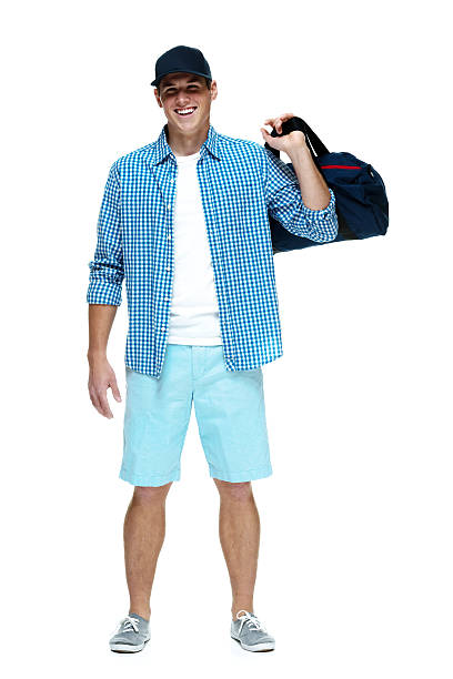 istock Cheerful casual man holding gym bag 469057612