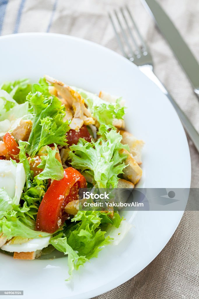 Caesar salad with chicken, cherry tomatoes, lettuce 2015 Stock Photo
