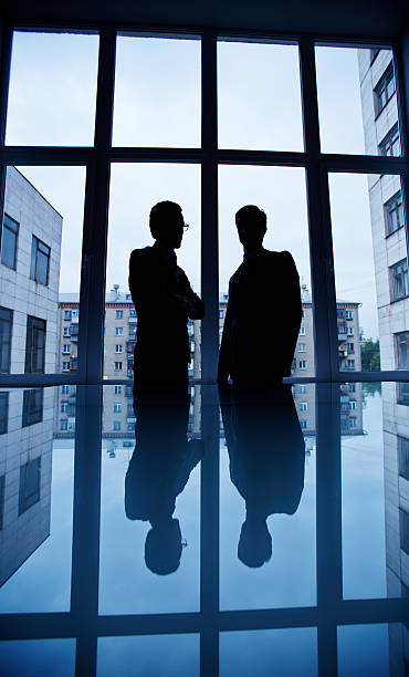 istock Businessmen by the window 469061178