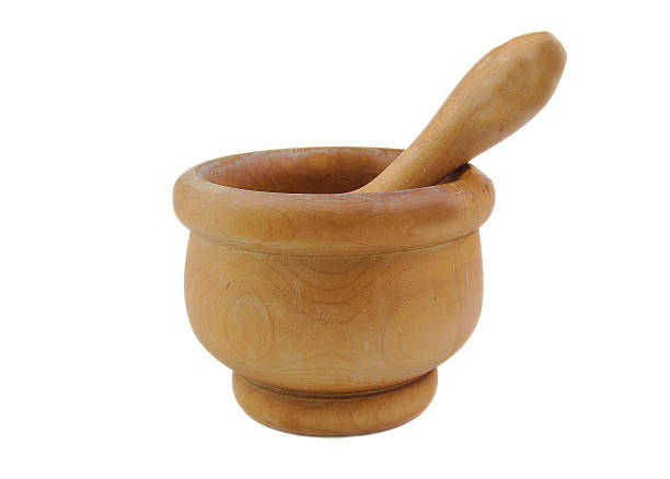 istock Wooden mortar and pestle on a white background 469062644