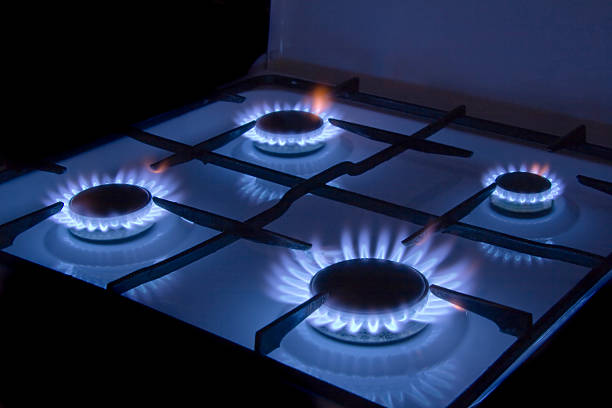 gas - flame gas natural gas blue photos et images de collection