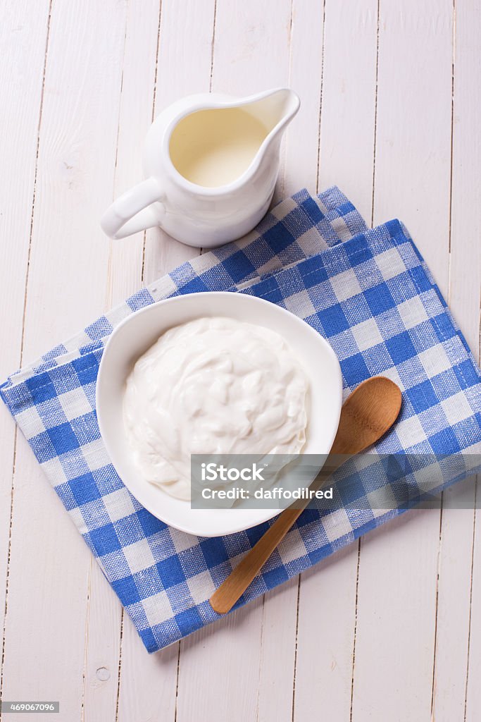 Dairy products -  sour cream, milk. Fresh dairy products - sour cream,  milk.  Rustic style. Bio/organic/natural ingredients. Healthy eating. 2015 Stock Photo