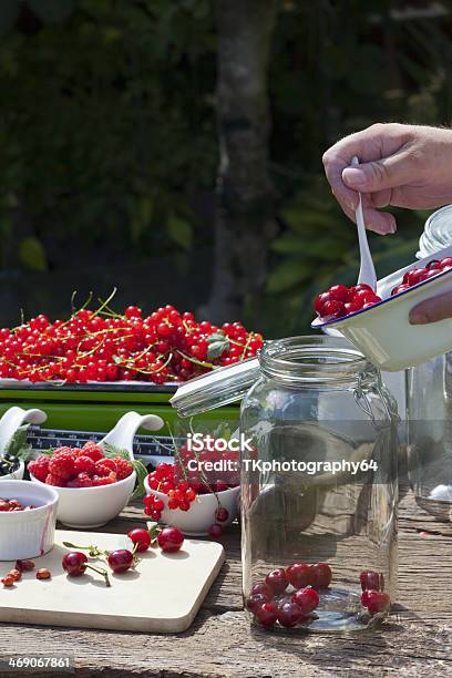 Fill Pitted Cherries In A Canning Jar Stock Photo - Download Image Now - Alcohol - Drink, Berry Fruit, Bowl