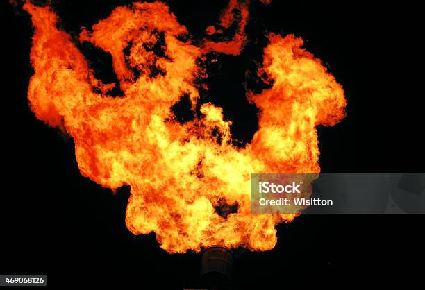 Gas Burn Or Flare Burn In Offshore Location Stock Photo - Download Image Now - 2015, Black Background, Campfire