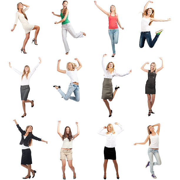 陽気な女性の動き - jumping business women dancing ストックフォトと画像