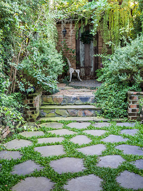 istock Stone pathway in English style green park 469069092
