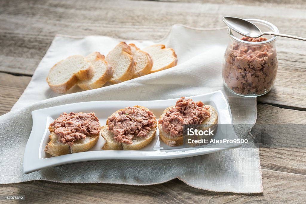 Sandwiches with pate on the wooden board 2015 Stock Photo