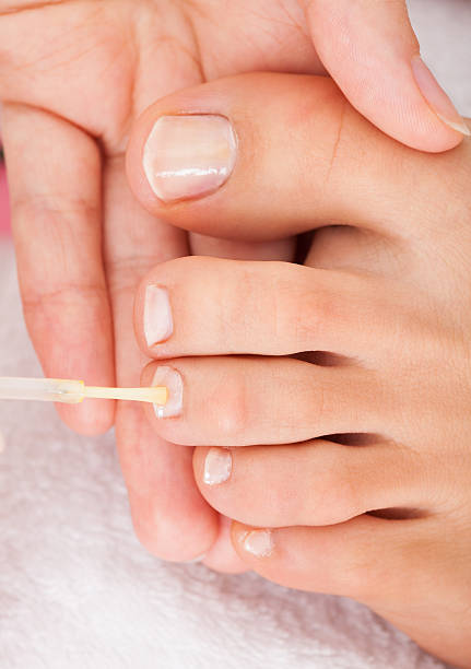 istock Beautician Applying Nail Varnish 469079423