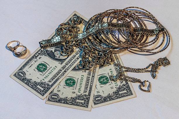 istock old jewelry and dollars 469081590