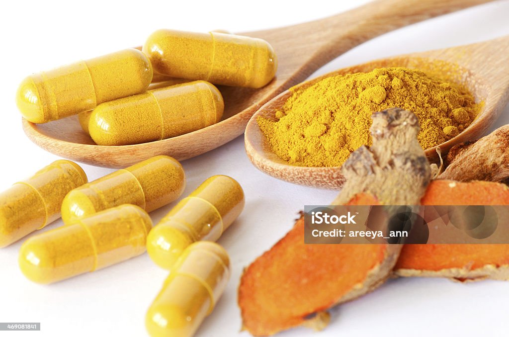 Tumeric powder and herbal medicine products. Turmeric Stock Photo