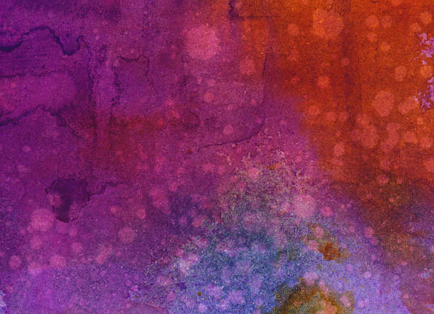 istock Warm watercolor paints with splatters and drips 469081858
