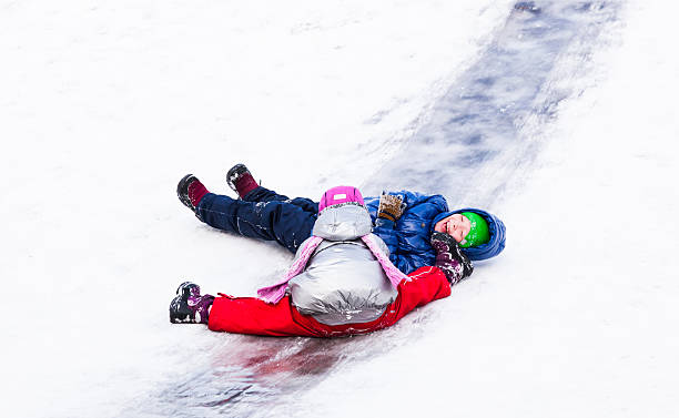 istock Children riding the hills in winter 469082276