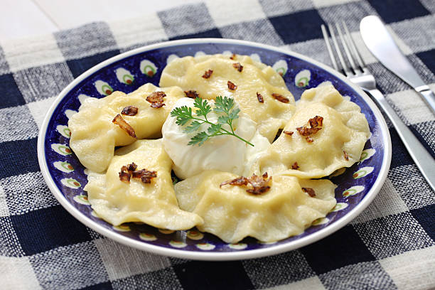 pierogi dumplings, polish food homemade pierogi dumplings, polish food pierogi stock pictures, royalty-free photos & images