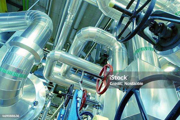 Industrial Zone Steel Pipelines Valves And Cables Stock Photo - Download Image Now