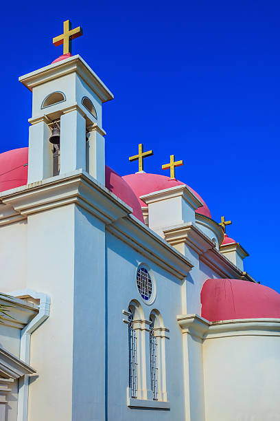 The red roofed towers of Saint John's Baptist Church in the old city of Acre, Akko Israel.